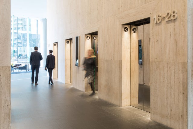 Elevator lobby with moving people