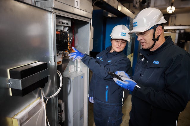 KONE engineers working